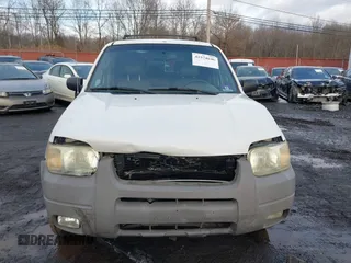 2002 Ford Escape XLT Choice with VIN 1FMYU04142KD82594, listed as a IAAI auction lot 41574646 with 173,174 mi miles. Bid and sale history available at carsss.com. Image 11.
