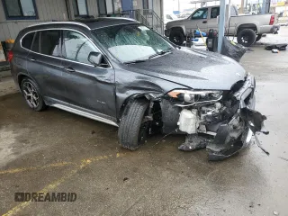 2016 BMW X1 xDrive28i with VIN WBXHT3C31G5E55041, listed as a Copart auction lot 48928705 with 104,799 mi miles and Salvage Title. Bid and sale history available at carsss.com. Image 4.