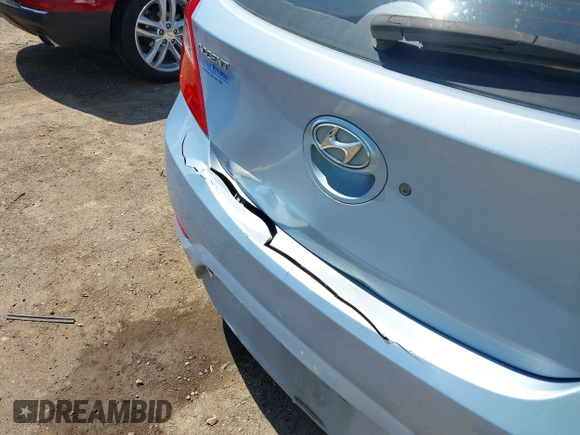 2012 Hyundai Accent SE with VIN KMHCU5AE0CU022050, listed as a IAAI auction lot 41955452 with 140,460 mi miles. Bid and sale history available at carsss.com. Image 6.