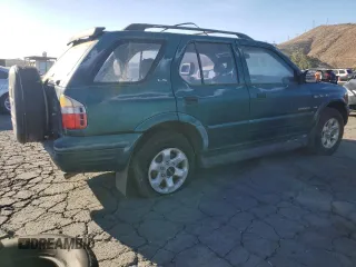 1999 Isuzu Rodeo S with VIN 4S2CK58W1X4349947, listed as a Copart auction lot 84634064 with 135,851 mi miles and Clean Title. Bid and sale history available at DreamBid. Image 3.