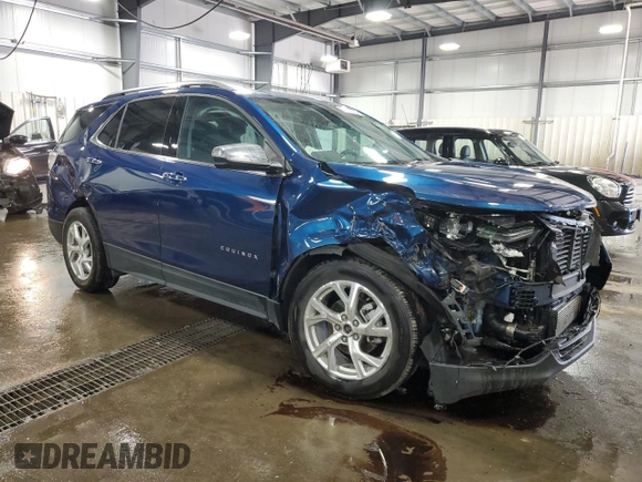 2020 Chevrolet Equinox Premier z VIN 2GNAXXEV0L6273682, wystawiony jako Copart lot #55155065 z przebiegiem 71 754 mil mil oraz Szkoda całkowita • Salvage title. Historia ofert i sprzedaży dostępna na DreamBid. Obrazek 4.