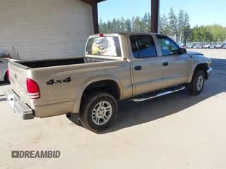2003 Dodge Dakota SLT with VIN 1D7HG48N03S344321, listed as a IAAI auction lot 42074421 with 96,489 mi miles and . Bid and sale history available at carsss.com. Image 4.