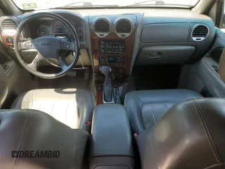 2003 GMC Envoy SLT with VIN 1GKET16S136235010, listed as a Copart auction lot 57380734 with 161,818 mi miles and Salvage Title. Bid and sale history available at DreamBid. Image 8.