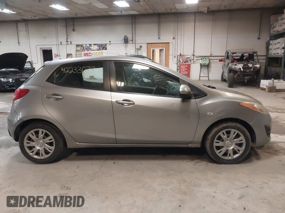 2012 Mazda 2 Sport with VIN JM1DE1KZ0C0149808, listed as a IAAI auction lot 42233078 with 166,111 mi miles and . Bid and sale history available at DreamBid. Image 14.