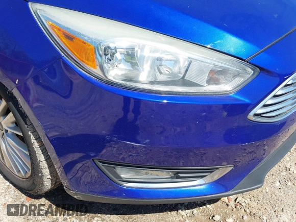 2015 Ford Focus Titanium with VIN 1FADP3J20FL304828, listed as a IAAI auction lot 42144101 with 199,715 mi miles and . Bid and sale history available at carsss.com. Image 6.