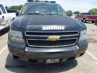 2013 Chevrolet Tahoe Commercial z VIN 1GNLC2E00DR337995, wystawiony jako IAAI lot #42213635 z przebiegiem Nie podano mil oraz . Historia ofert i sprzedaży dostępna na DreamBid. Obrazek 11.