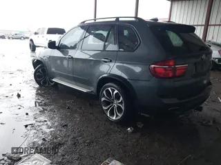 2011 BMW X5 50i with VIN 5UXZV8C59BL419527, listed as a IAAI auction lot 42173425 with 185,802 mi miles and . Bid and sale history available at DreamBid. Image 3.