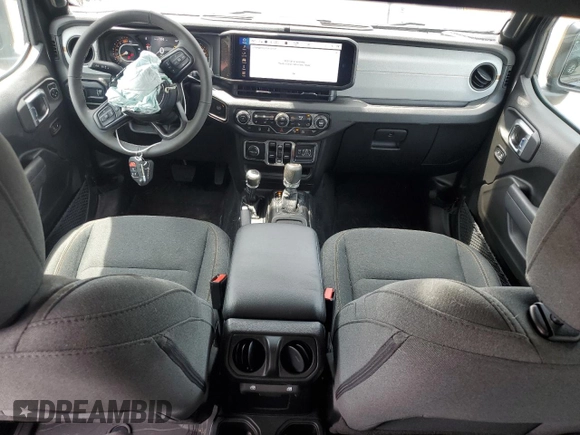 2025 Jeep Wrangler Sport S with VIN 1C4PJXDN0SW521570, listed as a Copart auction lot 60039565 with 3,083 mi miles and Salvage title. Bid and sale history available at DreamBid. Image 8.