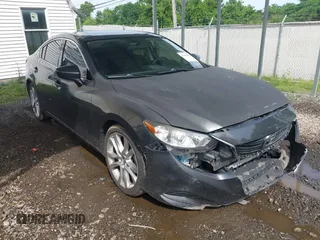 2015 Mazda 6 i Touring with VIN JM1GJ1V52F1184009, listed as a IAAI auction lot 42298465 with 98,577 mi miles and . Bid and sale history available at DreamBid. Image 1.