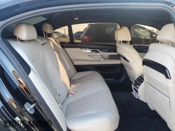 2016 BMW 7 Series 740i с VIN WBA7E2C54GG504200, выставлен на аукционе Copart как лот 46369885 с пробегом 70 606 миль миль и Списание • Salvage title. История ставок и продаж доступна на DreamBid. Изображение 10.