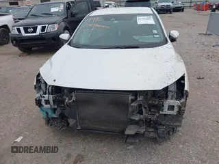 2020 Honda Civic LX with VIN 19XFC2F62LE021811, listed as a IAAI auction lot 41591466 with 75,797 mi miles and . Bid and sale history available at DreamBid. Image 13.