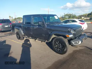 2023 Jeep Gladiator Sport S with VIN 1C6HJTAG4PL507092, listed as a IAAI auction lot 41221714 with 29,566 mi miles and . Bid and sale history available at DreamBid. Image 1.