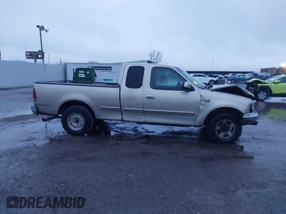 1999 Ford F-150 XL with VIN 1FTRX17L1XNA06282, listed as a IAAI auction lot 41545503 with 234,817 mi miles. Bid and sale history available at carsss.com. Image 13.