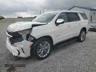 2021 Chevrolet Tahoe Premier with VIN 1GNSKSKD8MR102895, listed as a Copart auction lot 57859955 with 94,125 mi miles and Salvage title. Bid and sale history available at DreamBid. Image 1.