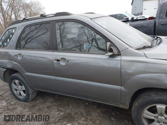 2009 Kia Sportage LX with VIN KNDJF724997570871, listed as a IAAI auction lot 41003267 with 231,654 mi miles and . Bid and sale history available at carsss.com. Image 13.