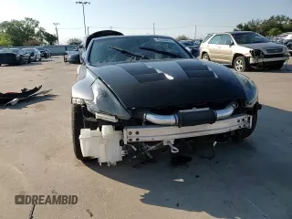 2017 Nissan 370Z z VIN JN1AZ4EH1HM950035, wystawiony jako Copart lot #70534664 z przebiegiem 63 667 mil mil oraz Szkoda całkowita • Salvage title. Historia ofert i sprzedaży dostępna na DreamBid. Obrazek 11.