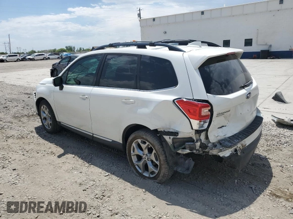2018 Subaru Forester Touring with VIN JF2SJAWC4JH435749, listed as a Copart auction lot 63526465 with 143,029 mi miles and Salvage title. Bid and sale history available at DreamBid. Image 2.