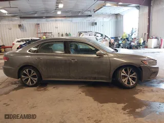 2021 Volkswagen Passat 2.0T SE with VIN 1VWSA7A30MC000721, listed as a IAAI auction lot 41614367 with 98,621 mi miles. Bid and sale history available at carsss.com. Image 13.