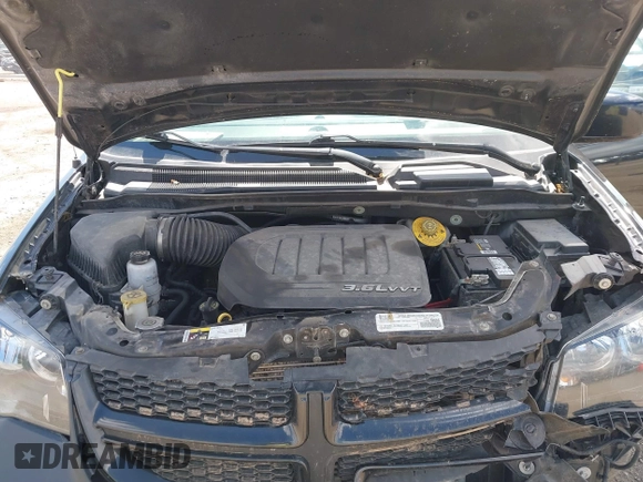 2017 Dodge Grand Caravan SXT with VIN 2C4RDGCG8HR756271, listed as a IAAI auction lot 41877283 with 136,598 mi miles and . Bid and sale history available at DreamBid. Image 10.