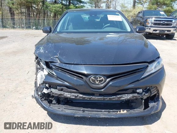 2020 Toyota Camry LE with VIN 4T1C11AK9LU387012, listed as a IAAI auction lot 42103647 with 64,049 mi miles and . Bid and sale history available at carsss.com. Image 13.