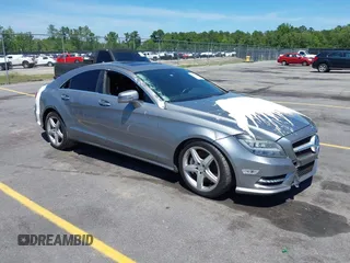 2013 Mercedes-Benz CLS 550 with VIN WDDLJ9BBXDA058040, listed as a IAAI auction lot 42159011 with 128,487 mi miles and . Bid and sale history available at DreamBid. Image 1.