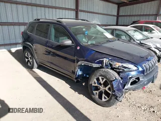 2015 Jeep Cherokee Trailhawk with VIN 1C4PJMBB1FW520649, listed as a IAAI auction lot 41991904 with 168,533 mi miles and . Bid and sale history available at DreamBid. Image 1.