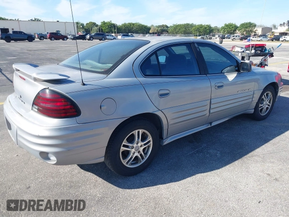 2000 Pontiac Grand Am SE z VIN 1G2NE52T8YM712695, wystawiony jako IAAI lot #41855853 z przebiegiem 63 914 mil mil oraz . Historia ofert i sprzedaży dostępna na DreamBid. Obrazek 4.