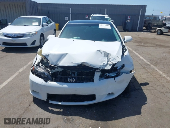 2006 Scion tC with VIN JTKDE167160120517, listed as a IAAI auction lot 42111042 with 174,220 mi miles. Bid and sale history available at carsss.com. Image 13.