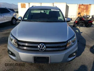 2012 Volkswagen Tiguan LE with VIN WVGAV7AX2CW580035, listed as a Copart auction lot 47297205 with 118,211 mi miles and Salvage title. Bid and sale history available at DreamBid. Image 5.