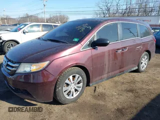 2014 Honda Odyssey EX-L with VIN 5FNRL5H60EB009083, listed as a IAAI auction lot 41633419 with 219,930 mi miles and . Bid and sale history available at carsss.com. Image 2.
