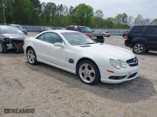 2004 Mercedes-Benz SL-Class with VIN WDBSK75FX4F064699, listed as a IAAI auction lot 42016319 with 176,764 mi miles. Bid and sale history available at carsss.com. Image 1.