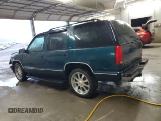 1998 GMC Yukon with VIN 1GKEC13RXWJ731667, listed as a Copart auction lot 78848954 with 202,164 mi miles and Salvage Title. Bid and sale history available at carsss.com. Image 2.