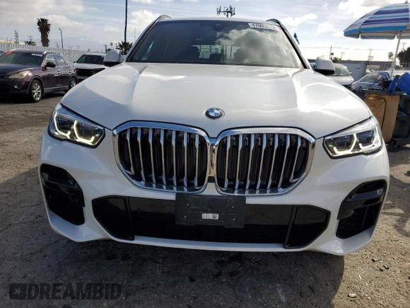 2022 BMW X5 sDrive40i with VIN 5UXCR4C06N9K56344, listed as a Copart auction lot 47600815 with 19,592 mi miles and Salvage Title. Bid and sale history available at carsss.com. Image 5.