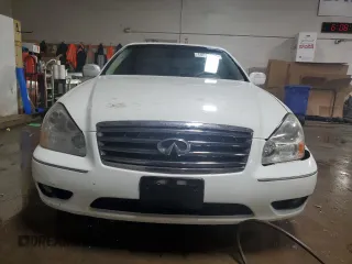 2005 Infiniti Q45 z VIN JNKBF01A55M101676, wystawiony jako Copart lot #44019275 z przebiegiem 157 254 mil mil oraz Szkody całkowita. Historia ofert i sprzedaży dostępna na DreamBid. Obrazek 5.