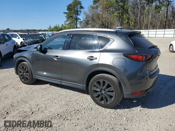 2021 Mazda CX-5 Signature with VIN JM3KFBEY2M0437304, listed as a Copart auction lot 88841415 with 57,100 mi miles and Salvage Title. Bid and sale history available at carsss.com. Image 2.