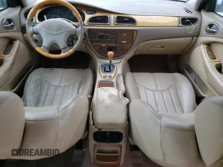 2000 Jaguar S-Type V6 z VIN SAJDA01C0YFL51640, wystawiony jako Copart lot #48708915 z przebiegiem 186 034 mil mil oraz Nie do naprawy • Non repairable. Historia ofert i sprzedaży dostępna na DreamBid. Obrazek 8.