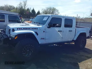 2021 Jeep Gladiator Rubicon with VIN 1C6JJTBG4ML536085, listed as a IAAI auction lot 41898204 with 39,627 mi miles and . Bid and sale history available at DreamBid. Image 14.
