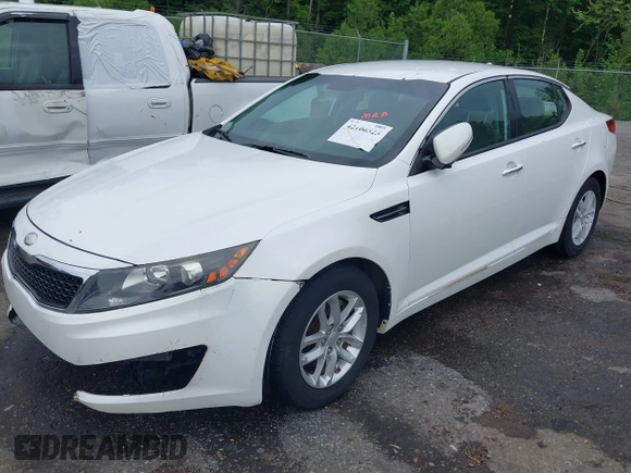 2013 Kia Optima LX z VIN KNAGM4A72D5366828, wystawiony jako IAAI lot #42106525 z przebiegiem 159 564 mil mil oraz . Historia ofert i sprzedaży dostępna na DreamBid. Obrazek 19.
