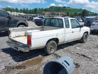 1995 Nissan Frontier XE with VIN 1N6SD16S9SC381048, listed as a IAAI auction lot 42365010 with 138,553 mi miles and . Bid and sale history available at DreamBid. Image 4.