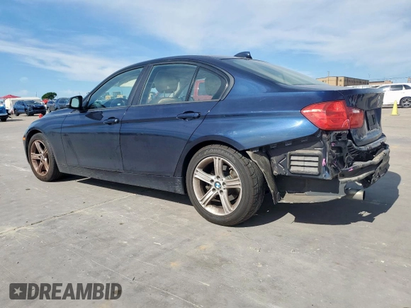 2015 BMW 3 Series 320i with VIN WBA3B1C58FK140327, listed as a Copart auction lot 57999675 with 124,437 mi miles and Salvage title. Bid and sale history available at DreamBid. Image 2.
