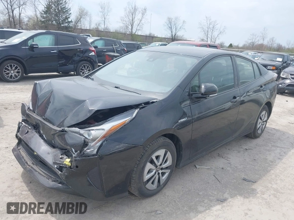 2017 Toyota Prius Two with VIN JTDKARFUXH3041931, listed as a IAAI auction lot 42075004 with 75,768 mi miles and . Bid and sale history available at DreamBid. Image 2.