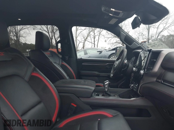 2022 Ram 1500 TRX with VIN 1C6SRFU9XNN476106, listed as a IAAI auction lot 41627895 with 21,992 mi miles and . Bid and sale history available at DreamBid. Image 5.