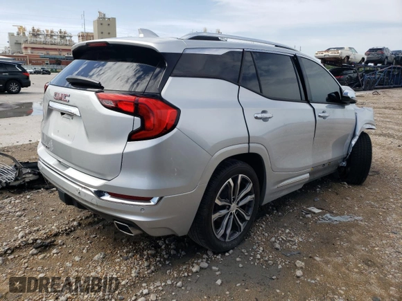 2018 GMC Terrain Denali z VIN 3GKALSEXXJL288082, wystawiony jako Copart lot #61041215 z przebiegiem 69 435 mil mil oraz Szkoda całkowita • Salvage title. Historia ofert i sprzedaży dostępna na DreamBid. Obrazek 3.