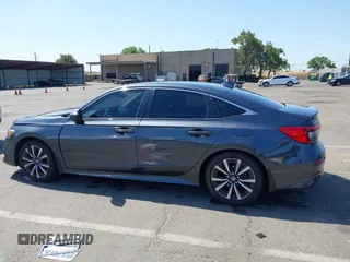 2023 Honda Civic EX with VIN 2HGFE1F74PH323979, listed as a IAAI auction lot 42499373 with 70,326 mi miles and . Bid and sale history available at DreamBid. Image 14.