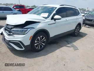 2024 Volkswagen Tiguan S with VIN 3VVRB7AXXRM105923, listed as a IAAI auction lot 42052697 with 18,421 mi miles and . Bid and sale history available at DreamBid. Image 2.