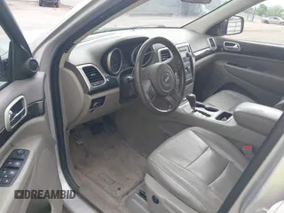 2011 Jeep Grand Cherokee Laredo with VIN 1J4RS4GGXBC564035, listed as a IAAI auction lot 41931861 with 242,291 mi miles and . Bid and sale history available at DreamBid. Image 15.