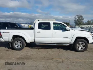 2015 Toyota Tacoma PreRunner with VIN 3TMKU4HN6FM044238, listed as a IAAI auction lot 41534623 with 196,490 mi miles and . Bid and sale history available at DreamBid. Image 13.
