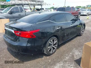 2017 Nissan Maxima S with VIN 1N4AA6AP7HC414344, listed as a IAAI auction lot 42436531 with 97,318 mi miles and . Bid and sale history available at DreamBid. Image 4.