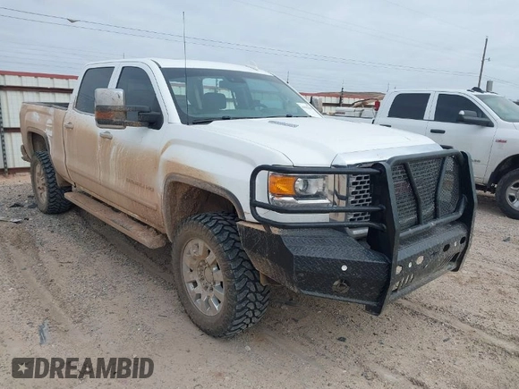 2015 GMC Sierra 2500HD available WiFi Denali with VIN 1GT120E84FF642823, listed as a IAAI auction lot 41593286 with 148,038 mi miles. Bid and sale history available at carsss.com. Image 1.