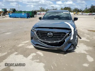 2022 Mazda CX-9 Grand Touring with VIN JM3TCBDY8N0621209, listed as a Copart auction lot 76873744 with 24,339 mi miles and Salvage Title. Bid and sale history available at carsss.com. Image 5.